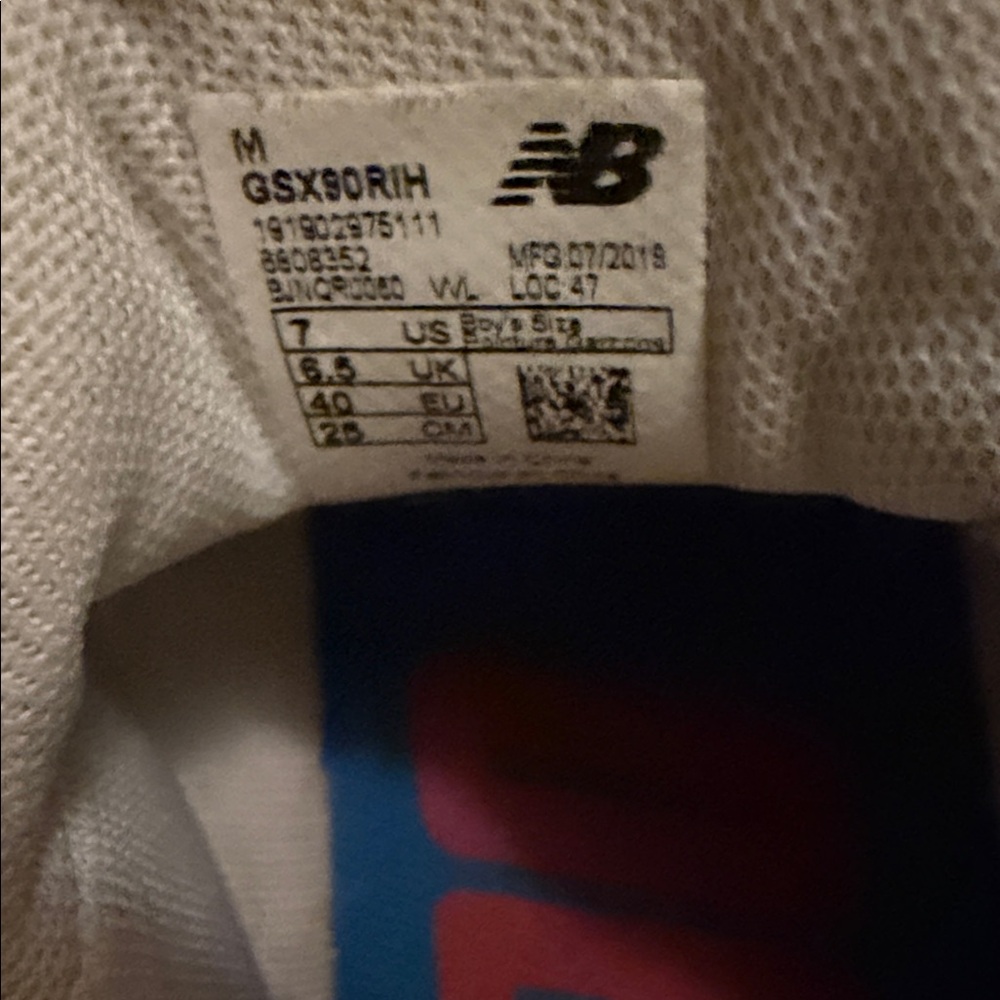 New Balance White Sneakers with Pink and Blue Accents